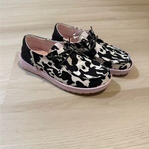 Hey Dude Black and White Cow Print Flats
